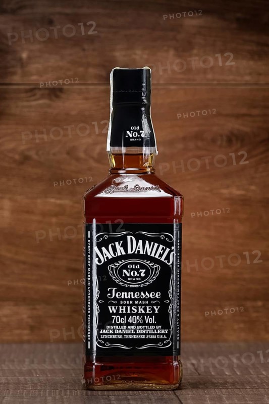Minsk, Belarus, December 13, 2016: Bottle of Jack Daniels on wooden counter as part of retail expo, Europe