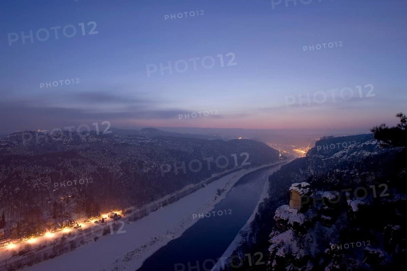 Bastei rock at full moon in winter