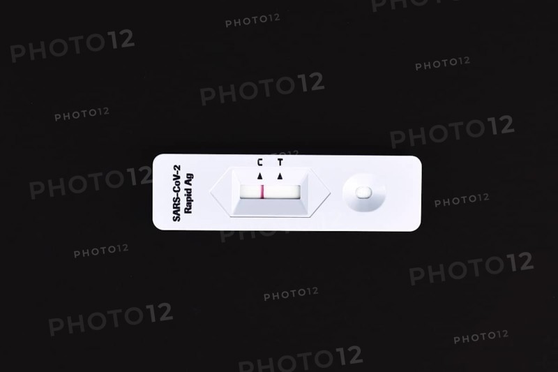 Corona Virus SARS-CoV-2 Rapid Antigen Test with negative result on black background