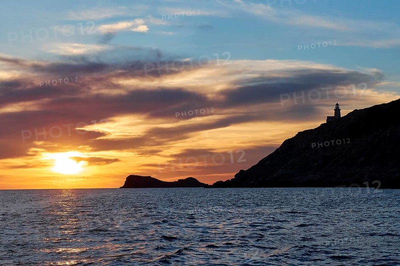 Lighthouse, Faro di Punta Libeccio, sunset, dusk, blue evening sky, grey clouds, Marettimo, Egadi Islands, Sicily, Italy, Europe