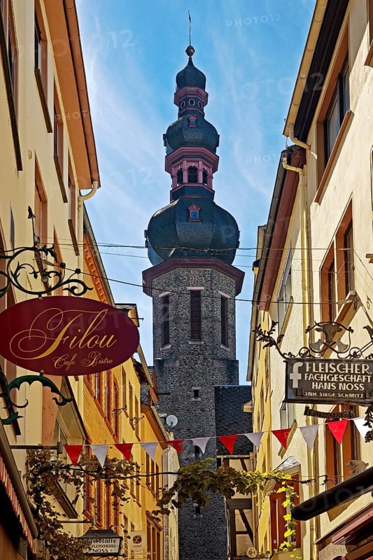 Tower of the parish church of St. Martin in a narrow alley in the historic old town, Cochem, Rhineland-Palatinate, Germany, Europe