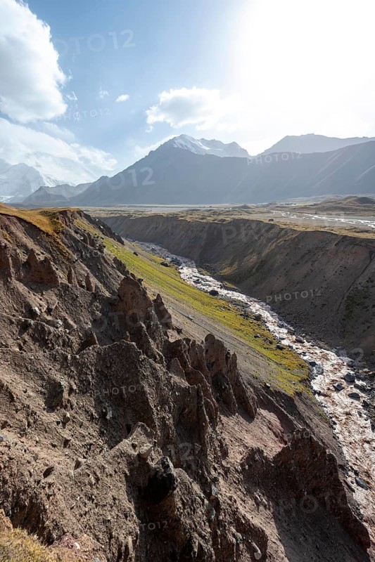 Valley with river Achik Tash between high mountains, mountain landscape with peak Pik Lenin, Osh province, Kyrgyzstan, Asia