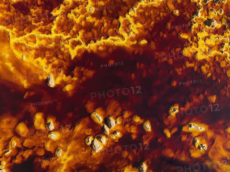 Detail of the Rio Tinto (Red river) with its deep reddish hue due to oxidised iron minerals in its water, aerial view, drone shot, Huelva province, Andalusia, Spain, Europe