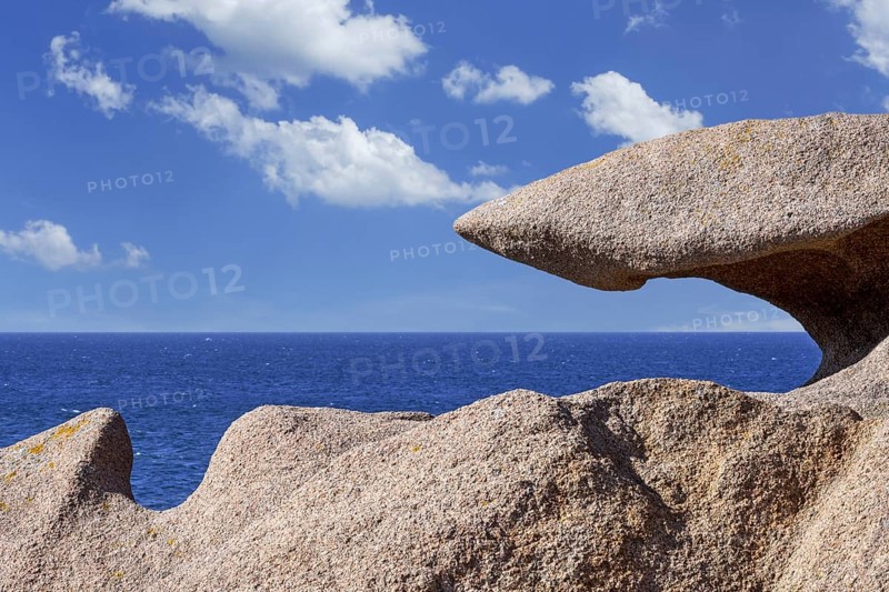 Strange rock formations and water, wind eroded boulders along the Côte de granit rose, Pink Granite Coast, Côtes d'Armor, Brittany, France, Europe
