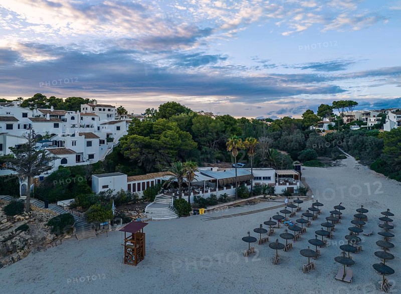 Sunset over Cala Anguila-Cala Mendia from a drone, Porto Cristo, Majorca, Spain, Europe