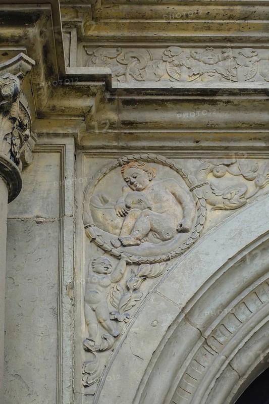 Detail above portal, putto, putto, relief, stone, Hohentübingen Palace, Museum of the University of Tübingen MUT, higher education institution, historical building, place of learning, Renaissance complex built in the 16th century, in the palace courtyard, Eberhard Karls University of Tübingen, Tübingen, Baden-Württemberg, Germany, Europe