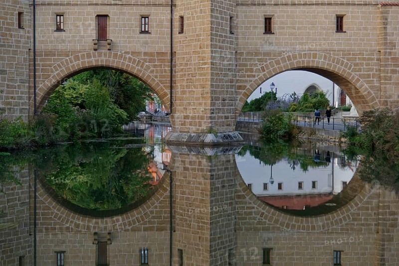 Clear reflection of the fortification wall in the river Vils, Amberg, Upper Palatinate, Bavaria, Germany, Europe