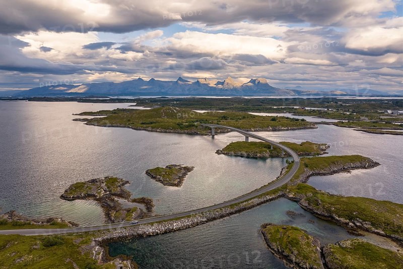 Road over small islands, behind the mountain Seven Sisters, Herøy island, Helgeland coast, Nordland, Norway, Europe