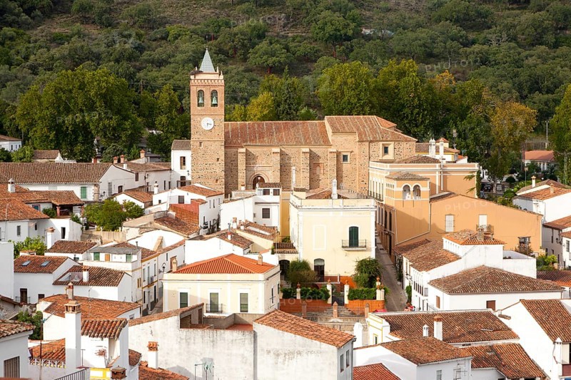 Church and houses in village of Almonaster La Real, Sierra de Aracena, Huelva province, Spain, Europe