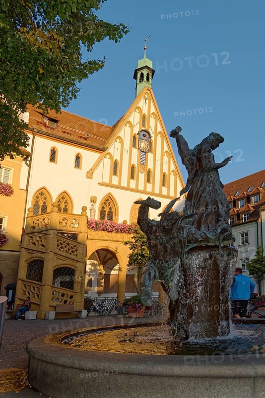Wedding fountain in front of a bright town hall building under a clear sky, Amberg, Upper Palatinate, Bavaria, Germany, Europe