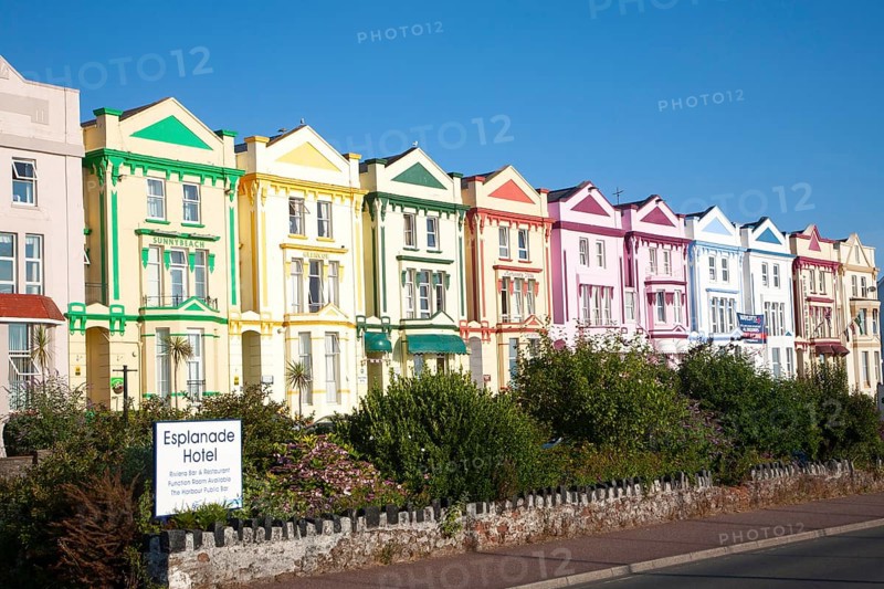 Colourfully painted guesthouses and hotels on the Esplanade, Paignton, Devon, England, United Kingdom, Europe