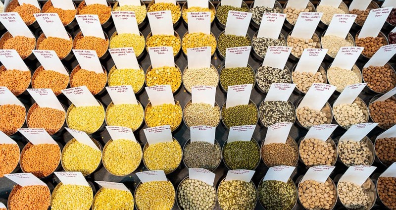 Samples of pulses kept on display inside a shop at a wholesale market ahead of the presentation of the Interim Budget 2024 by Union Finance Minister Nirmala Sitharaman, in Guwahati, Assam, India on Thursday, Feb. 1, 2024