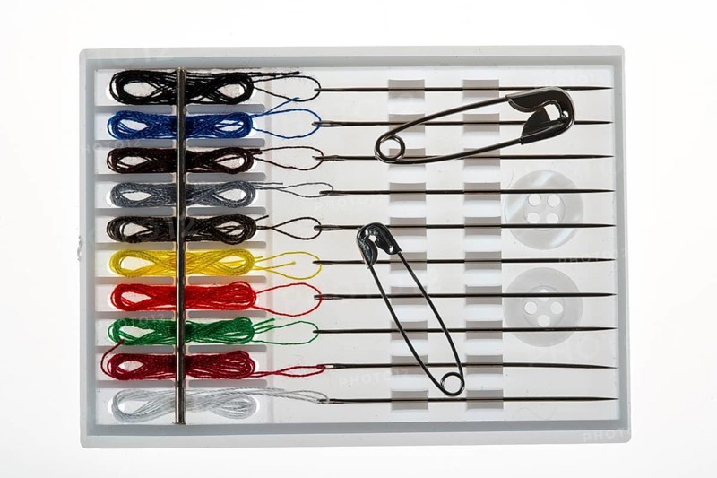 Sewing kit, sewing thread and sewing needles, already threaded, various colours, ready to sew, safety pins, spare buttons, hotel amenities