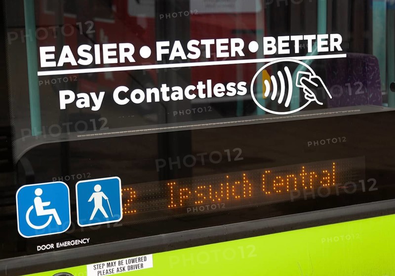 Pay Contactless sign on bus window, Ipswich, Suffolk, England, Uk