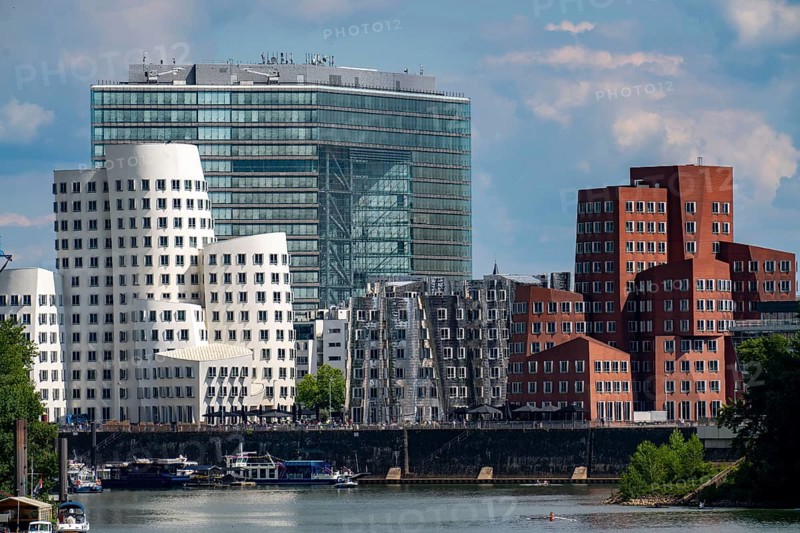 New Zollhof building complex, the Gehry buildings, at the Media Harbour, behind the Stadttor building, Düsseldorf, North Rhine-Westphalia, Germany, Europe