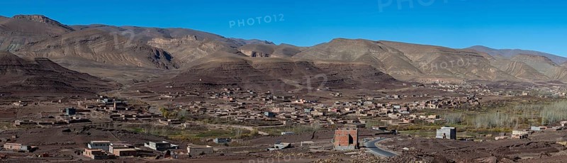 View of Taboulmante with colourful mountains in the background, layered landscape, Gorges du Dades, Dades Gorge, Morocco, Africa