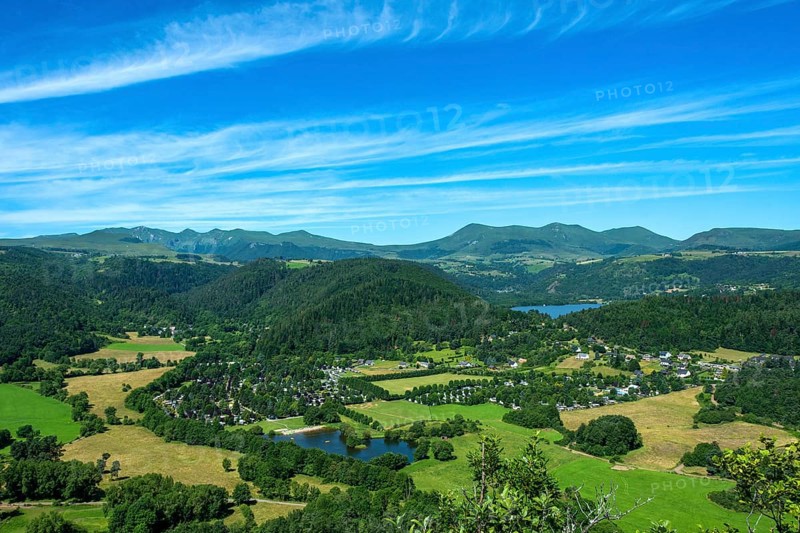 Panoramic view of Lake Chambon and the Sancy massif in the Auvergne Volcanoes Regional Natural Park, Puy-de-Dôme, Auvergne Rhone Alpes, France, Europe