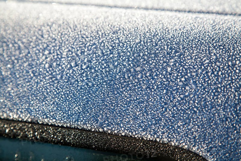 Freezing Ice crystals frost cold morning car roof winter UK