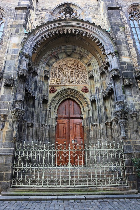 The north portal with tympanum of the Teyn Church, a Roman Catholic church of the Virgin Mary in front of the Teyn in Prague's Old Town on the Old Town Square, Prague, Czech Republic, Europe