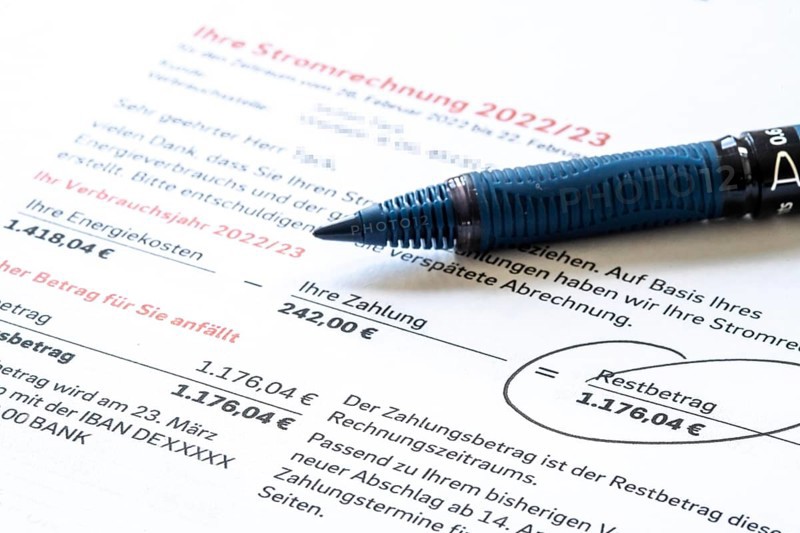 Symbolic image of electricity bill, billing of an electricity provider, additional payment due to increased energy costs and also consumption of electricity
