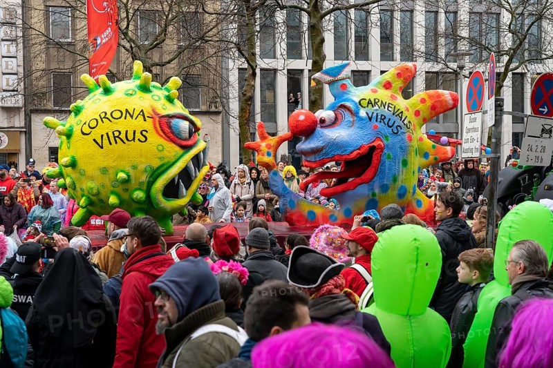 Rose Monday parade in Düsseldorf, street carnival, carnival float, by float builder Jacques Tilly, the carnival virus gives the coronavirus the long nose