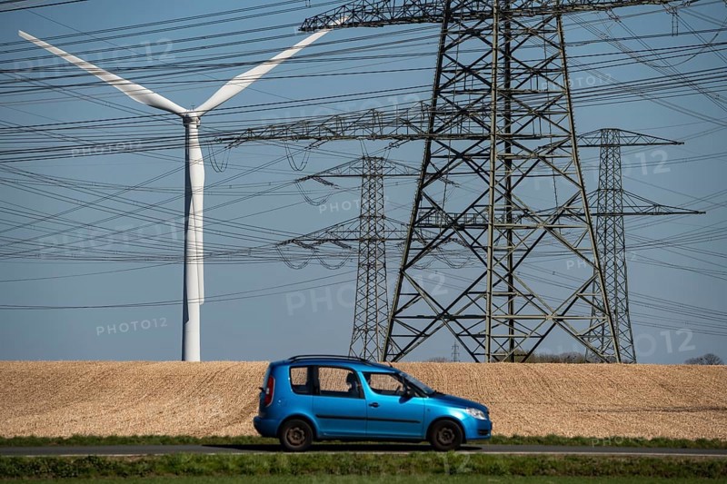 Part of a line route, 380 KV extra-high-voltage line, wind turbine, near Hüchelhoven, district town of Bergheim, Rhein-Kreis-Neuss, North Rhine-Westphalia, Germany, Europe