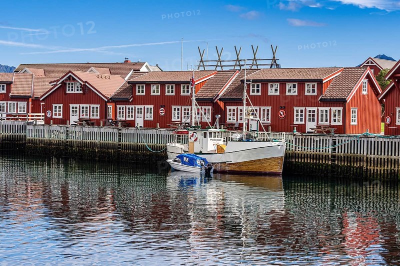 Typical red wooden houses at the harbor, Svolvær, Lofoten, Norway, Europe