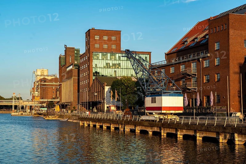 The inner harbour, in Duisburg, Küppersmühle building, and Werhahn Mill, granary with Explorado Children's Museum, right, North Rhine-Westphalia, Germany, Europe