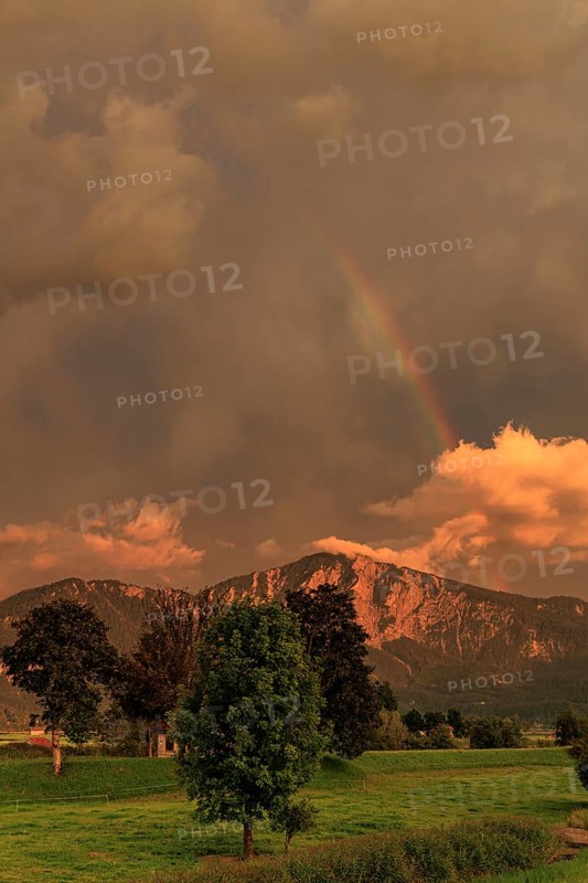 Evening mood with clouds and rainbow over mountains, summer, Loisach-Lake Kochel-Moore, view of Rabenkopf and Jochberg, Bavaria, Germany, Europe
