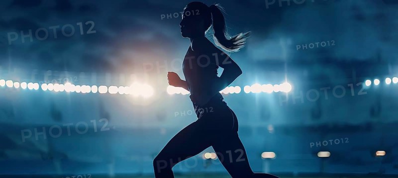 Determined young runner during a strenuous exercise running on a stadium on runner track, AI generated