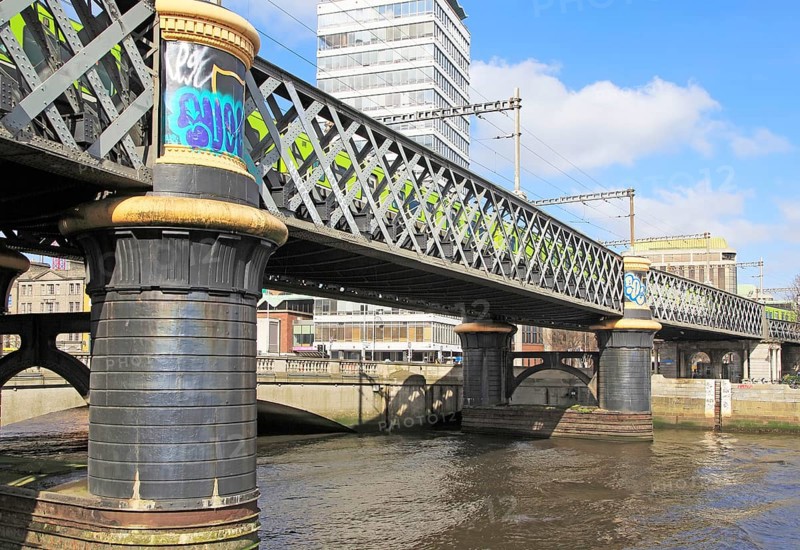 Loopline rail bridge or Liffey viaduct spanning river from Pearse railway station, Dublin, Ireland, built 1891 designed by John Chaloner Smith, Europe