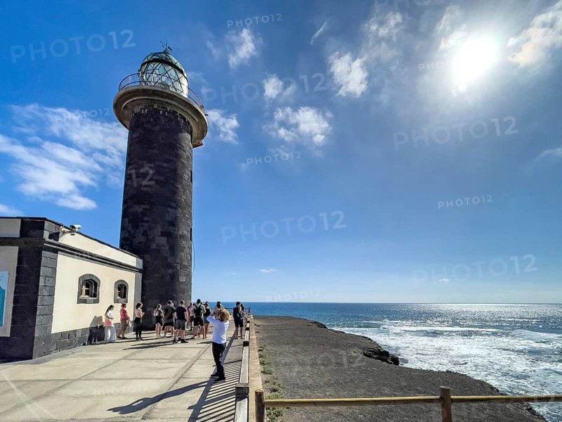 Aerial view of lighthouse Faro Punta de Jandia at the southern tip of peninsula Jandia, on the right at the edge of the picture white whitecaps on moving sea swell at reef reef edge onshore sea strong surf, Fuerteventura, Canary Islands, Canary Islands, Spain, Europe