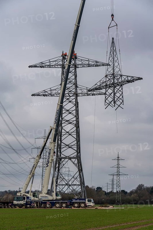 Installation of a high-voltage pylon, construction of a new line route, near Neuss-Holzheim, North Rhine-Westphalia, Germany, Europe
