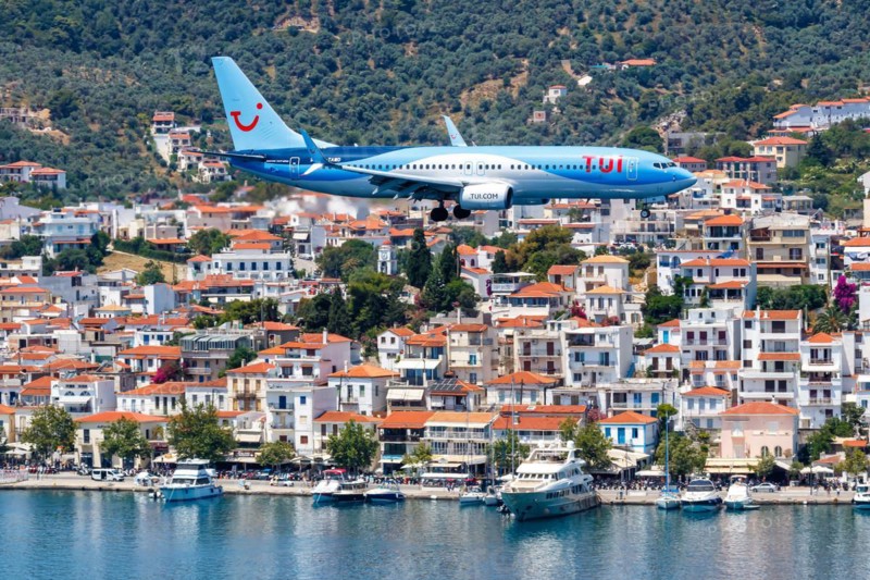 A TUI Airways Boeing 737-800 aircraft with the registration G-TAWD at Skiathos Airport, Greece, Europe