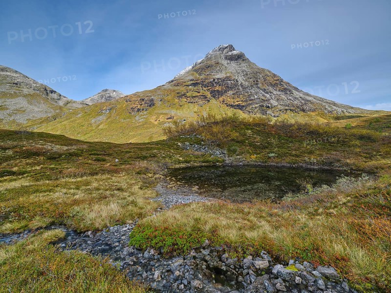 Øvstevatnet with mountain, autumn in Reinheimen National Park, Møre og Romsdal, Norway, Europe