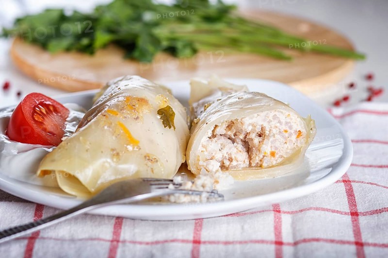 Cabbage rolls with beef, rice and vegetables on a linen tablecloth on a linen tablecloth. close up