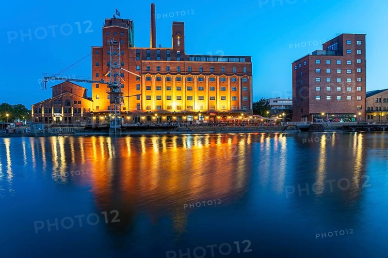 The inner harbour, in Duisburg, Werhahn-Mühle building on the left, granary with Explorado children's museum, North Rhine-Westphalia, Germany, Europe