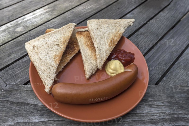 Bockwurst sausage sausage served on a plate with slices of toast, Mecklenburg-Vorpommern, Germany, Europe