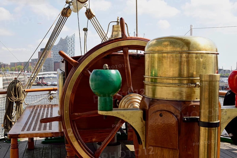 Europe, Germany, Hamburg, Elbe, museum ship, windjammer Rickmer Rickmers, view of steering wheel and compass, Elbe Philharmonic Hall concert hall in the background, Europe