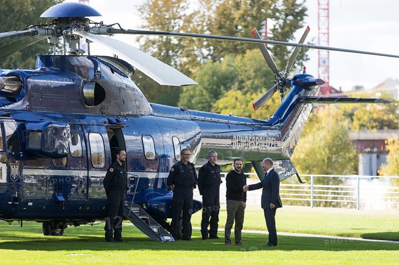 Volodymyr Zelensky (President of Ukraine) is received by Olaf Scholz (Chancellor of the Federal Republic of Germany) after his arrival by helicopter in front of the Federal Chancellery, 11 October 2024