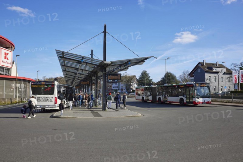 Bus station with departing bus in Hattingen, Ennepe-Ruhr-Kreis, North Rhine-Westphalia, Germany, Europe