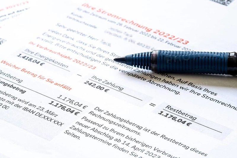 Symbolic image of electricity bill, billing of an electricity provider, additional payment due to increased energy costs and also consumption of electricity