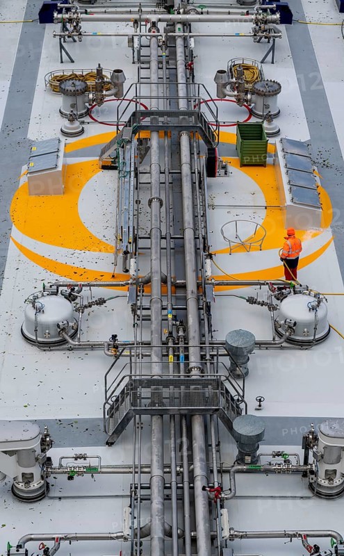 Gas tanker, Brinjal, transports butane gas to the petrochemical company INEOS in Cologne, ship's personnel clean the deck, cargo ship on the Rhine North Rhine-Westphalia, Germany, Europe