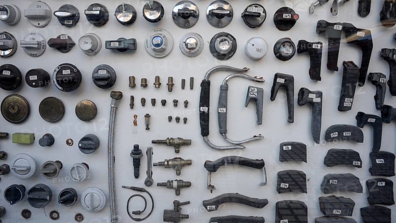View into the shop window of an antiquarian plumbing shop with numbered spare parts of all kinds, Buenos Aires, Argentina, South America