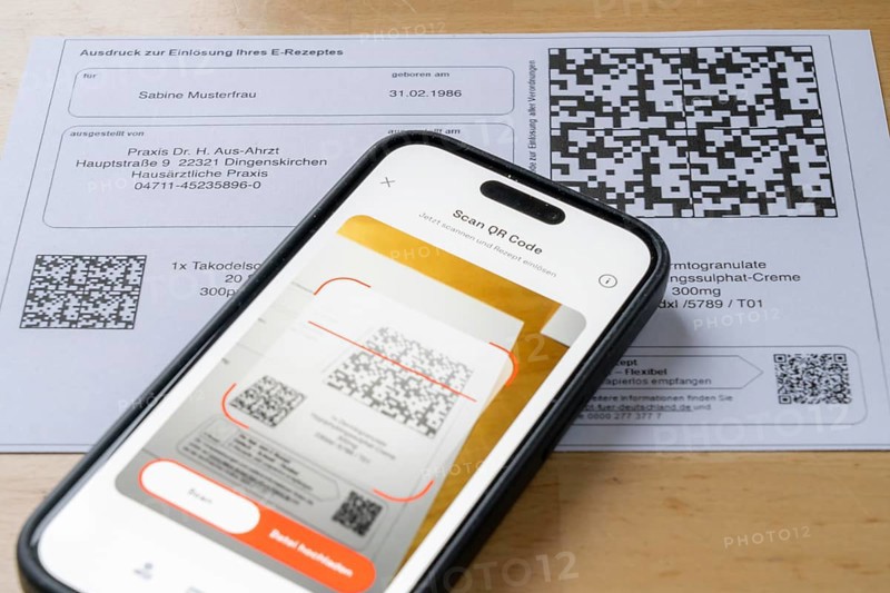 Symbolic image of an e-prescription, prescription issued by a doctor, with QR code, is scanned using a mobile phone and a special app, the code is then shown in the pharmacy and the prescription, which is stored on an IT server, can be retrieved there in conjunction with the health card
