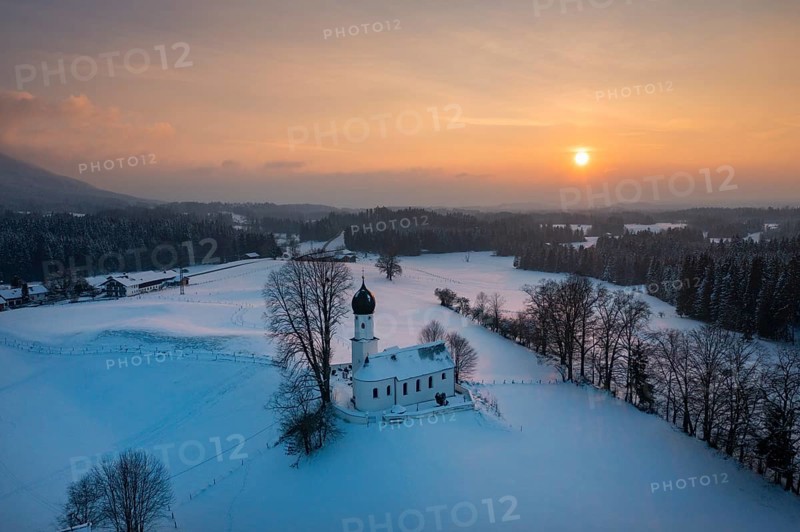 Sunset, Church of the Visitation of the Virgin Mary in winter, Oberbuchen, drone shot, Tölzer Land, Upper Bavaria, Bavaria, Germany, Europe