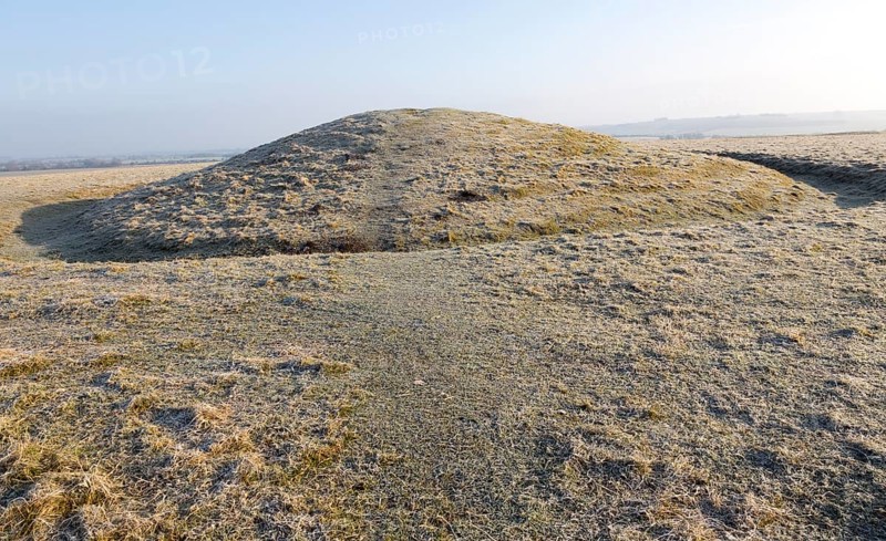 Bronze Age bowl barrow on Windmill Hill, a Neolithic causewayed enclosure, near Avebury, Wiltshire, England, UK