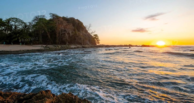 Sunset over the sea, coast near Montezuma, Nicoya Peninsula, Puntarenas Province, Costa Rica, Central America