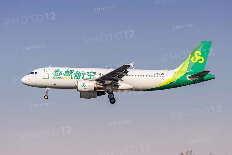 A Spring Airlines Airbus A320 aircraft with the registration number B-6705 at Hongqiao Airport (SHA) in Shanghai, China, Asia