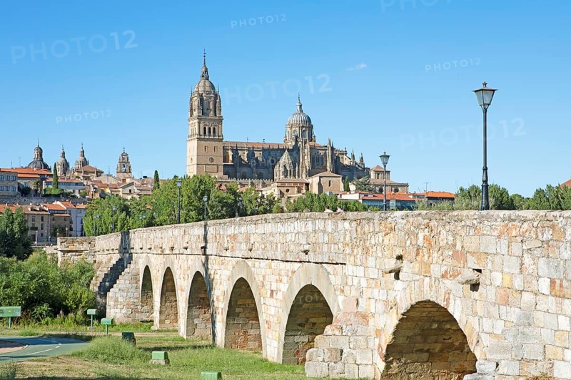 Puente Romano or Romanesque bridge, behind the cathedral of Salamanca, province of Salamanca, Castile and Leon, Spain, Europe